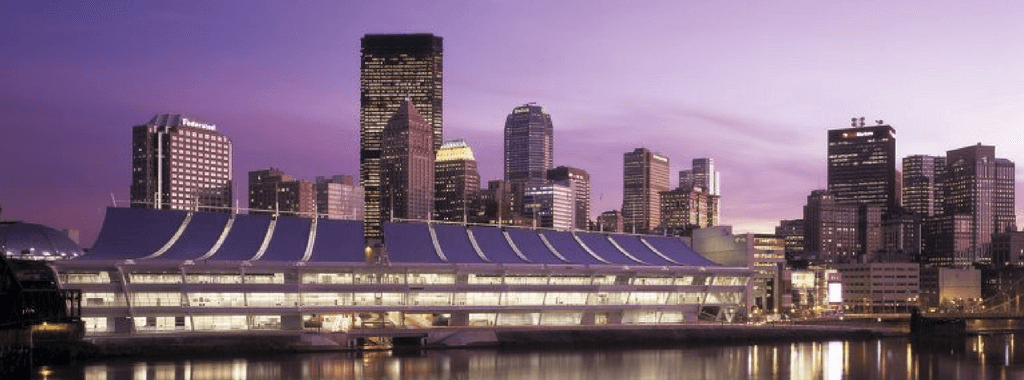 Photo of the David L. Lawrence Convention Center against the backdrop of Pittsburgh - location of the Abstractions conference